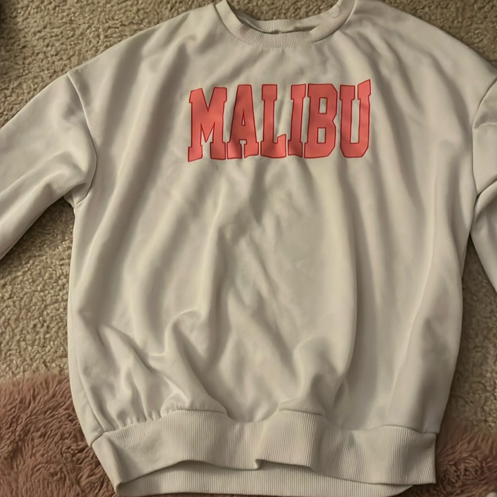 White sweatshirt that says Malibu from Amazon